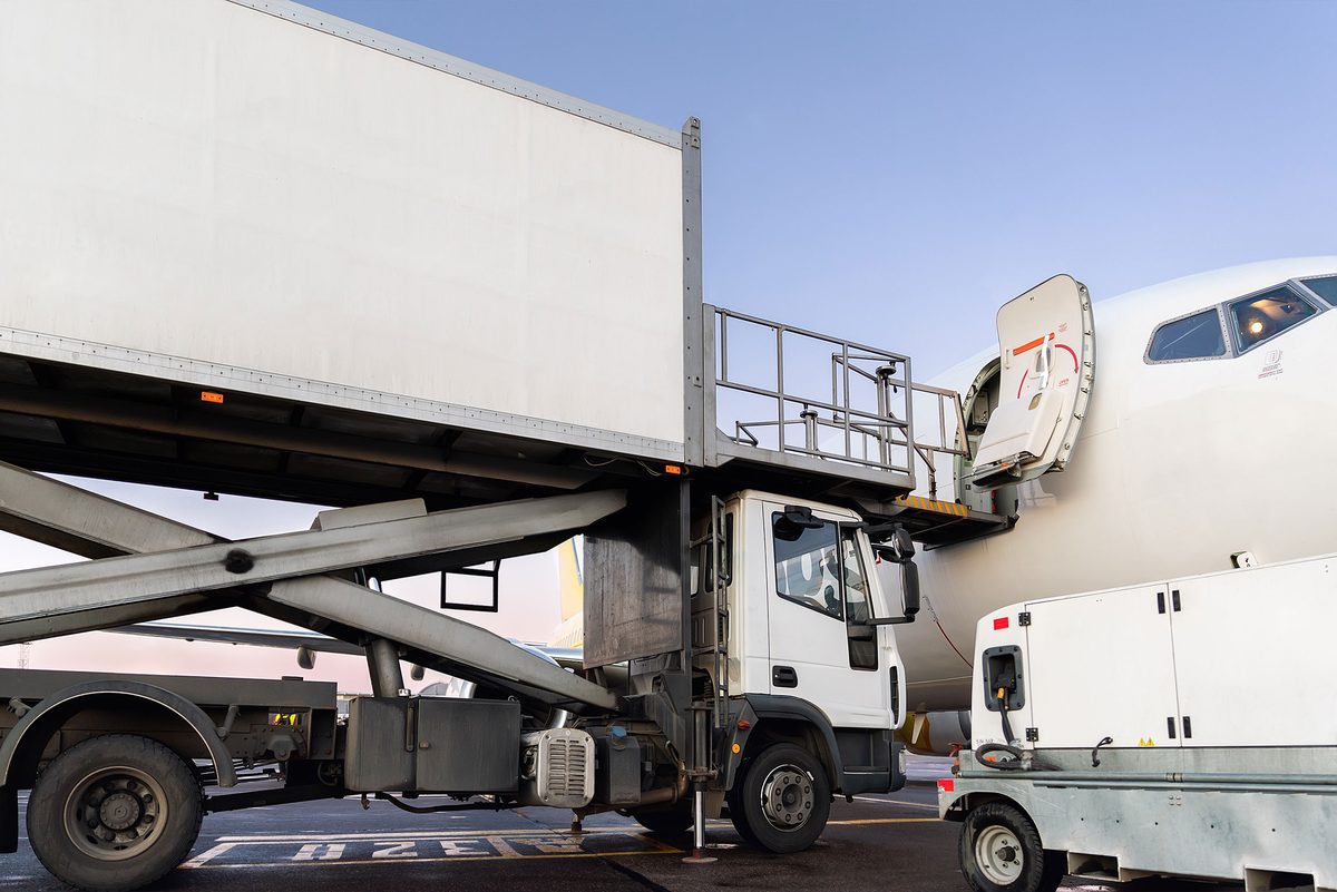 Catering and loading vehicles servicing an aircraft